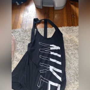 4 different Nike tanks